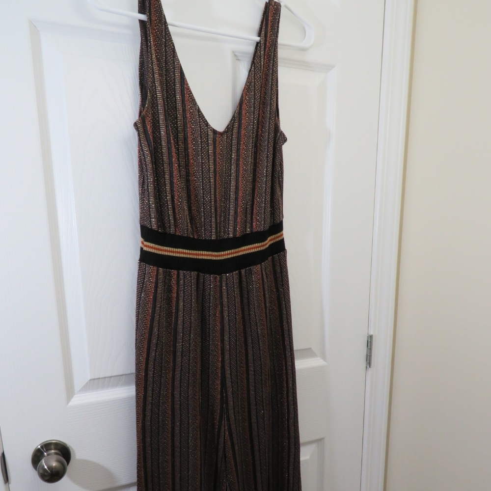 Fancy jumpsuit perfect for special occasion.